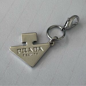 Prada Silver Triangle Logo Charm with Lobster Clasp